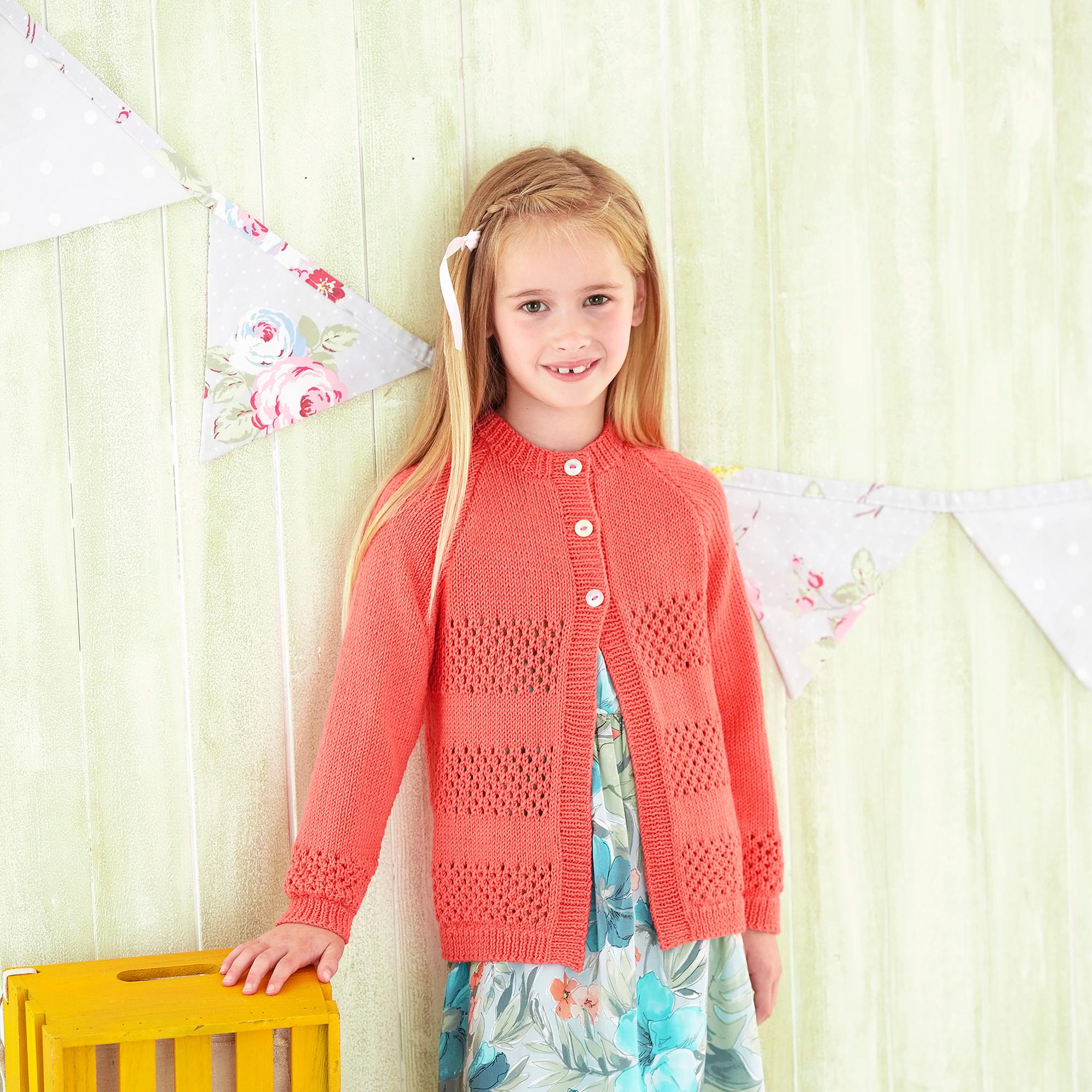 Lasten neuletakki pitsiraidoilla