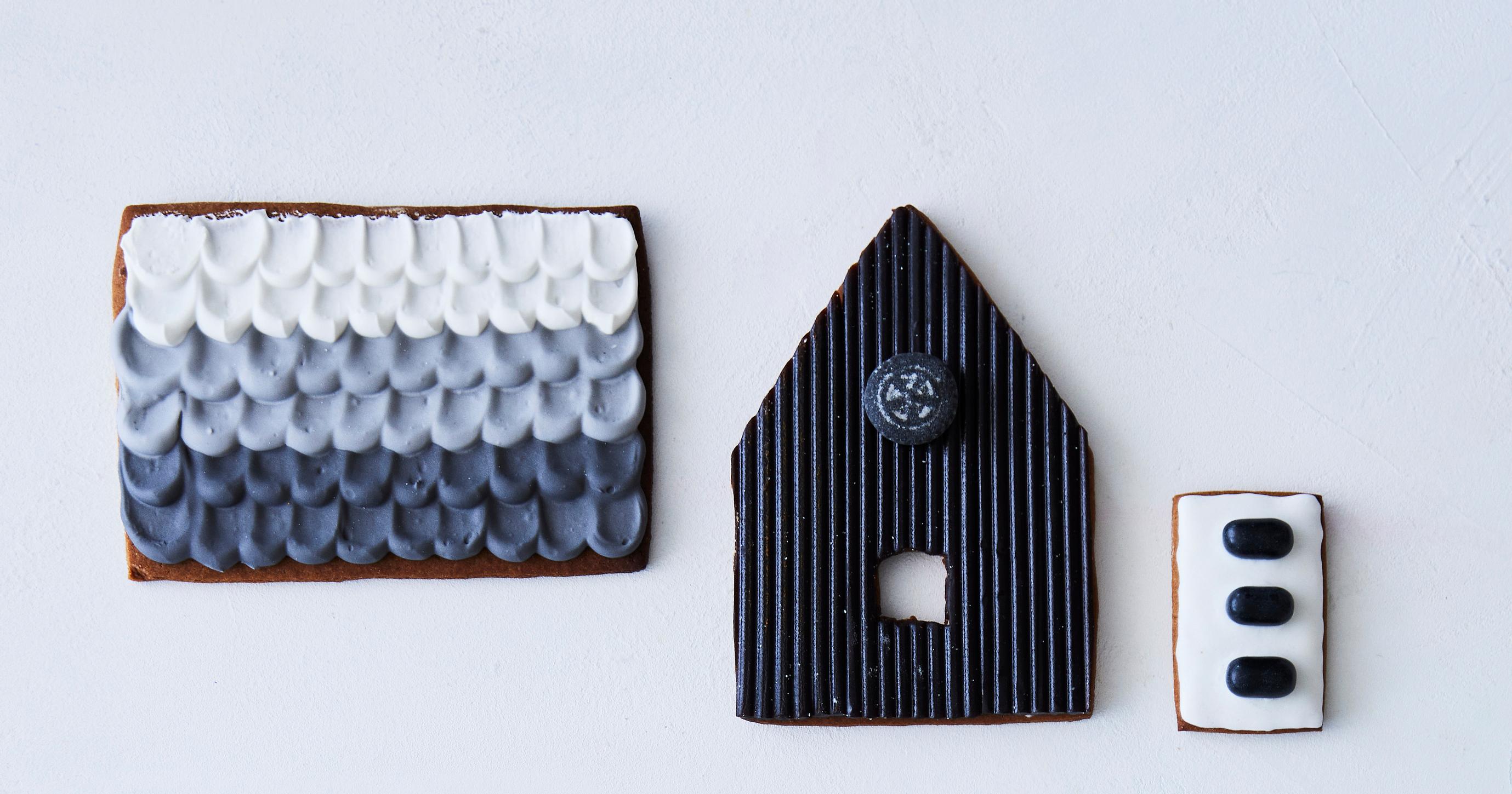 Modernin puutalon tyylisiä piparkakkutalon osia