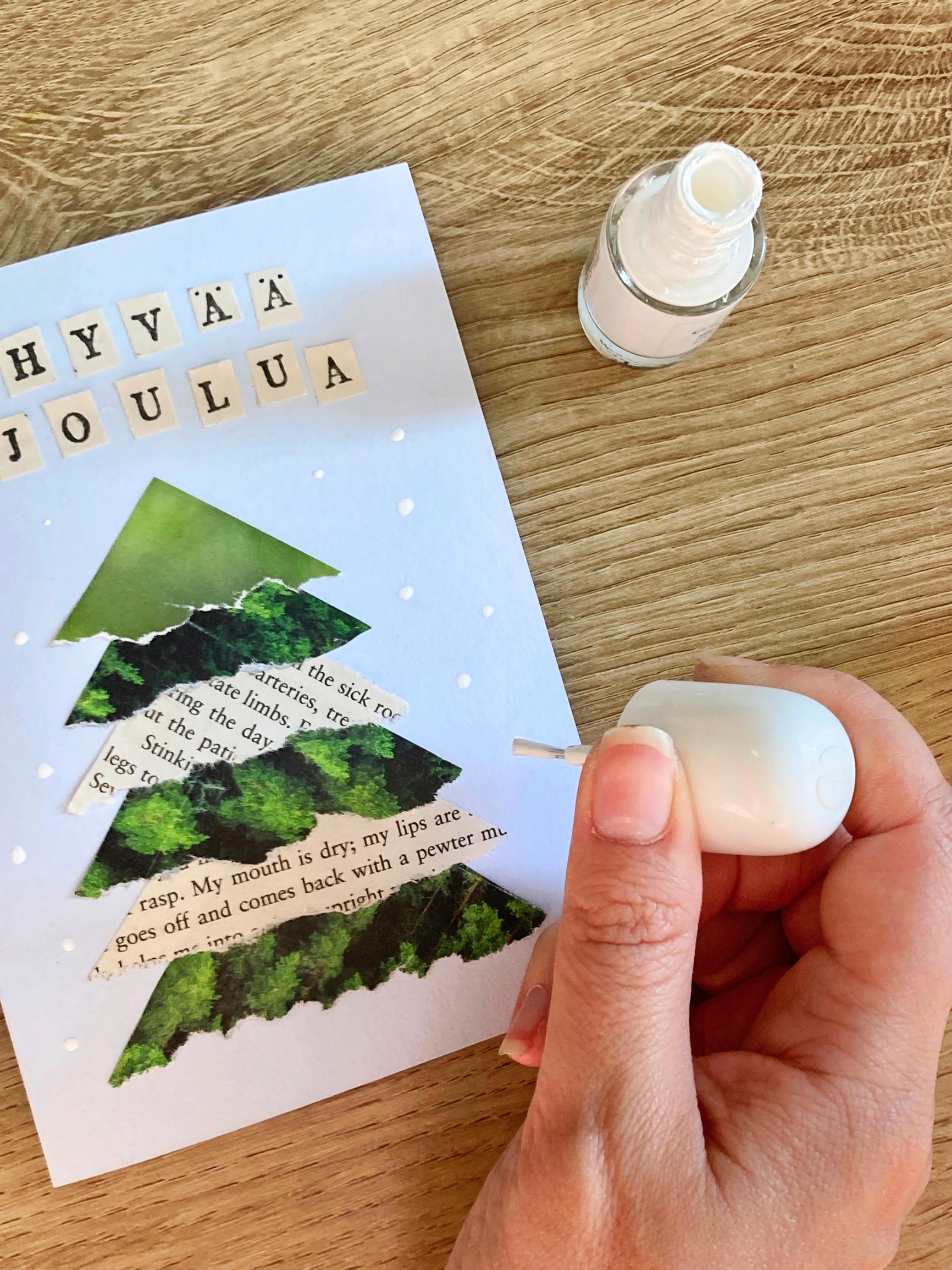 Lumihiutaleiden maalaus onnistuu kätevästi valkoisella kynsilakalla.