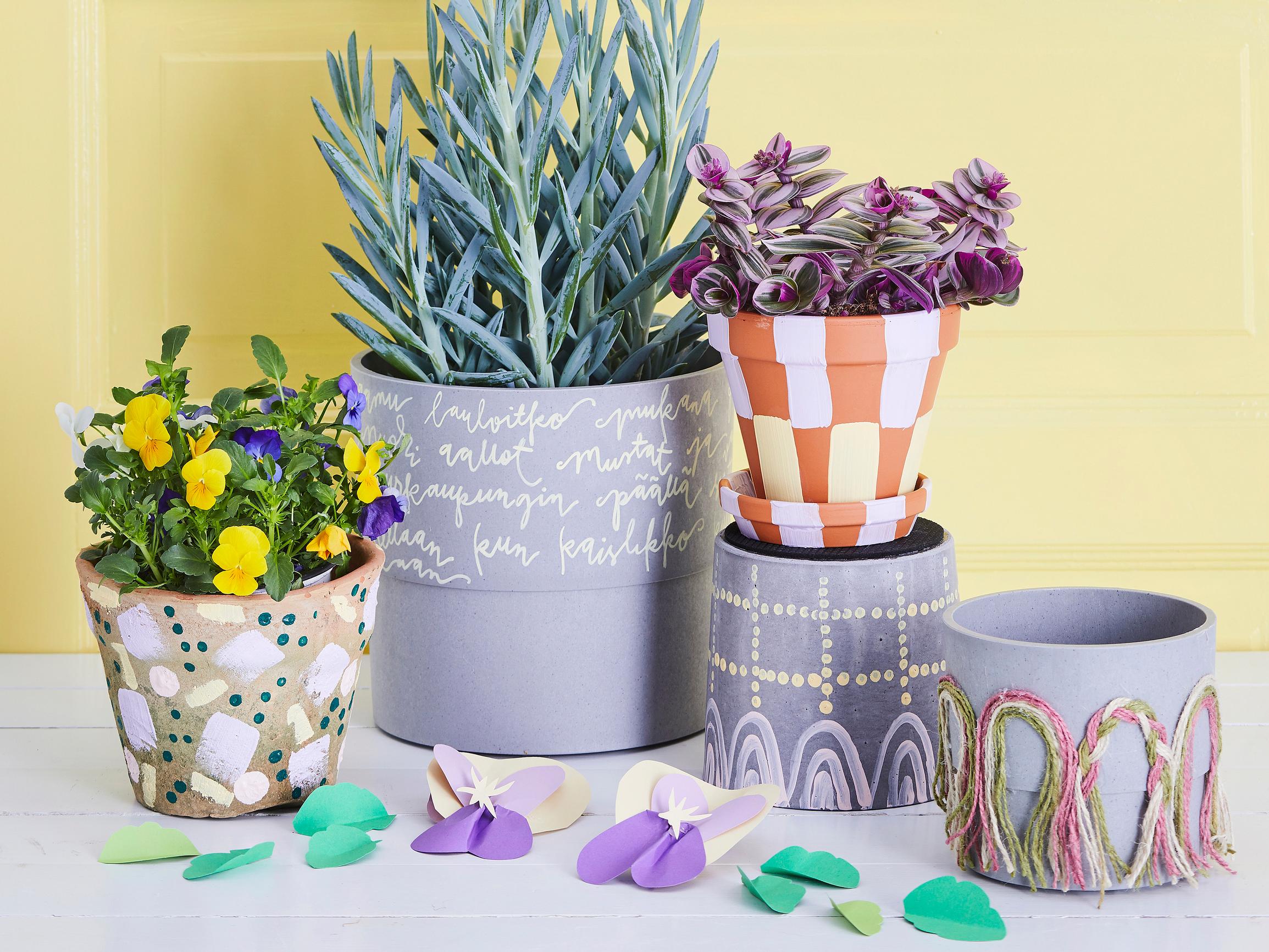Pastellipintaa, palloja ja nauhoja! Näin koristelet kukkaruukut iloisiksi