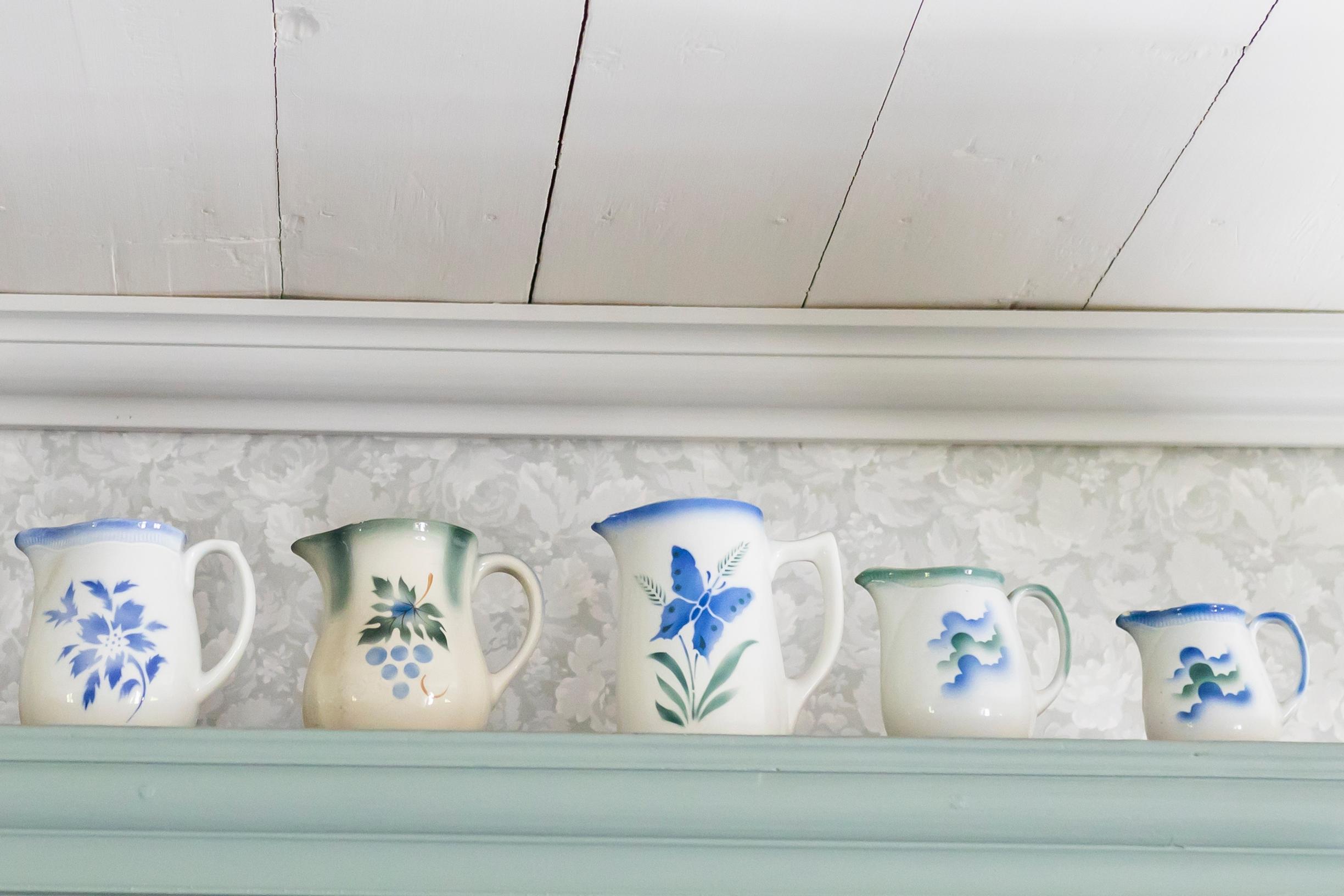 vanhoja maitokannuja