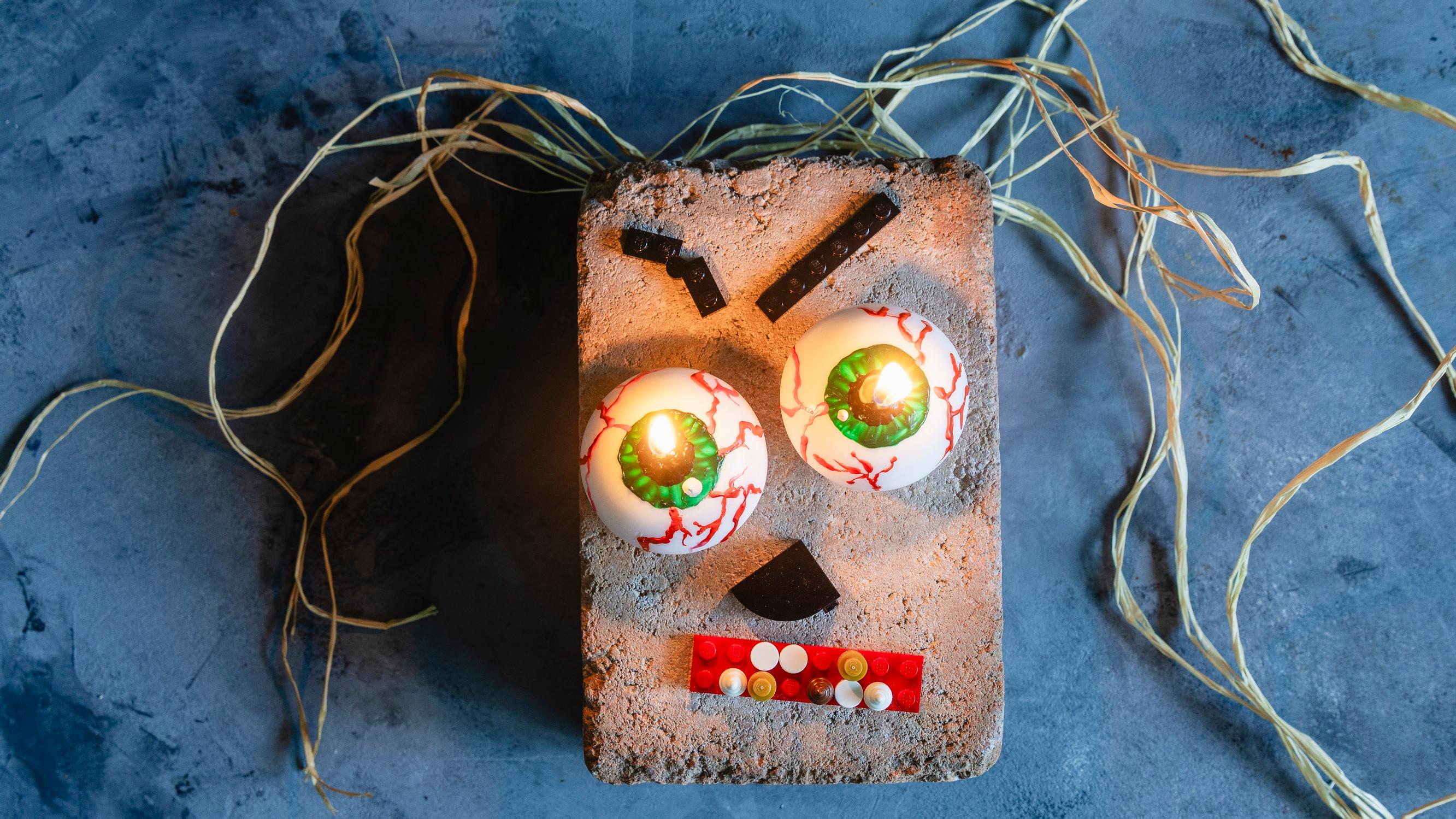 Tuunaa pyöreistä kynttilöistä karmeita palavia irtosilmiä halloweeniksi – jopas on polttava katse! 