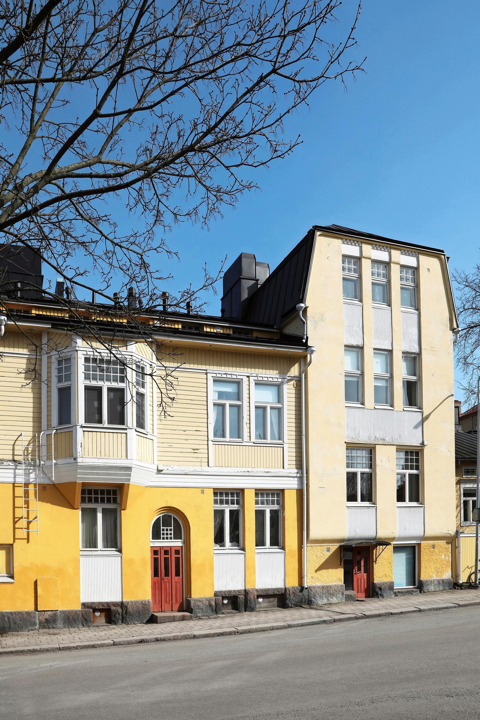 Keltainen, vanha kauppiaan talo Tutun Port Arthurissa
