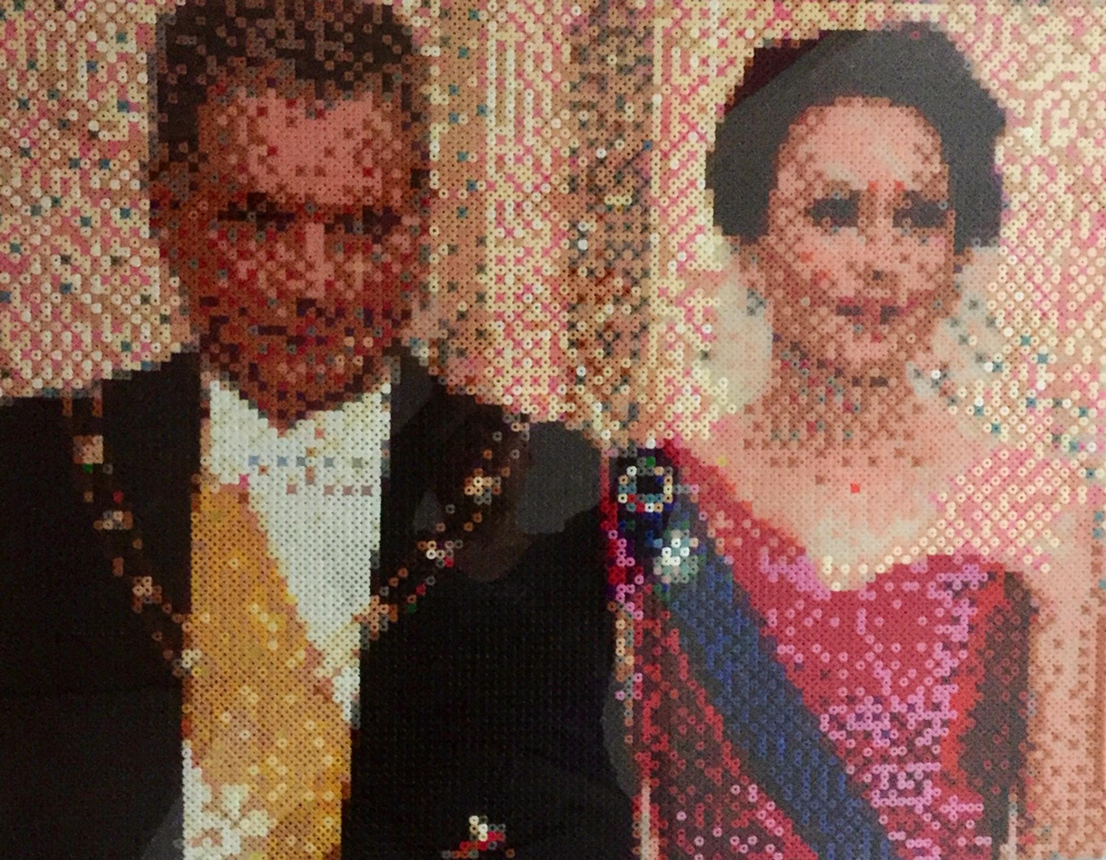 Kuva hamahelmitaulusta, jossa Sauli Niinistö ja Jenni Haukio