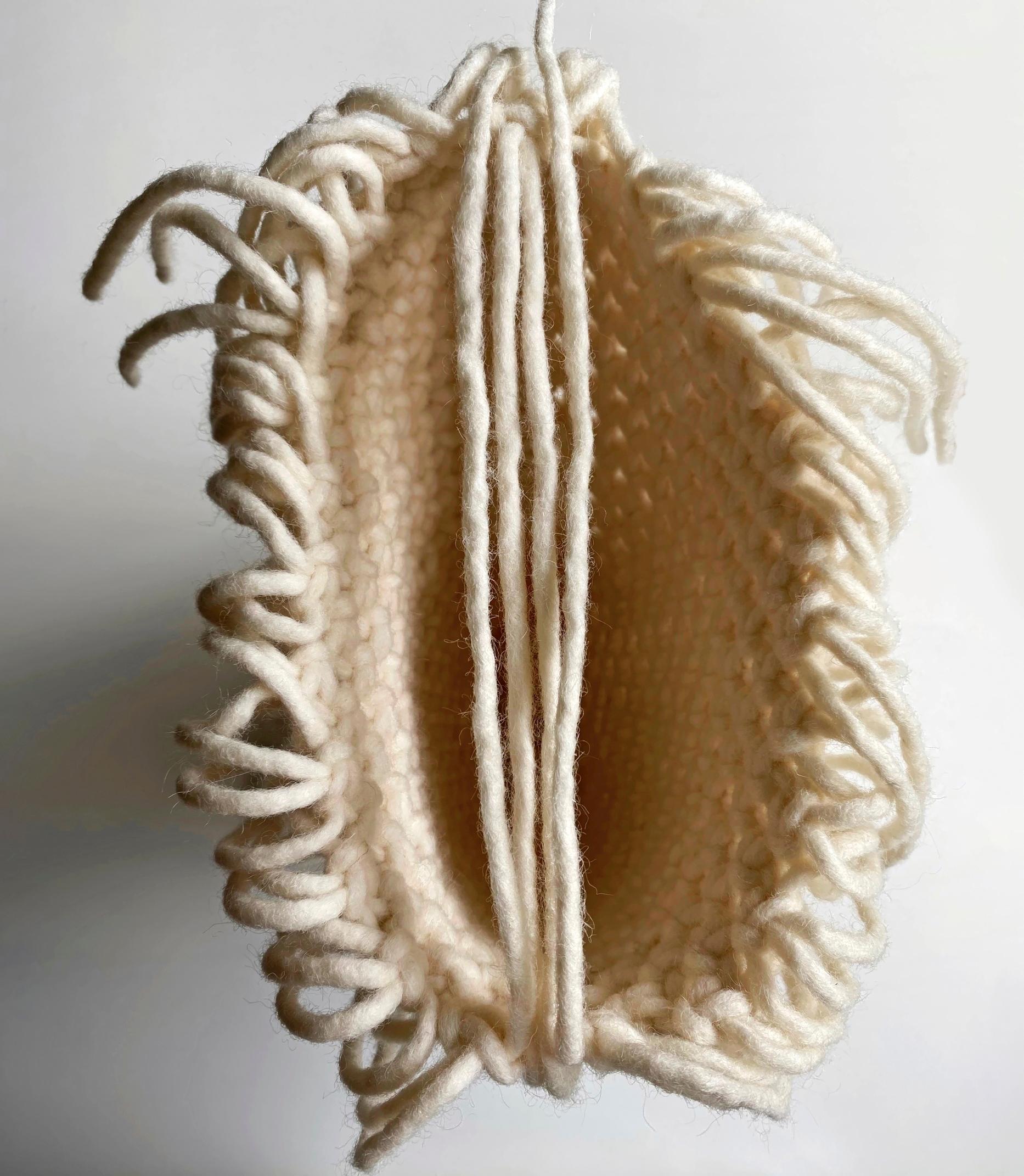 Pohjan solmujen tukilankojen erottelu keskelle.