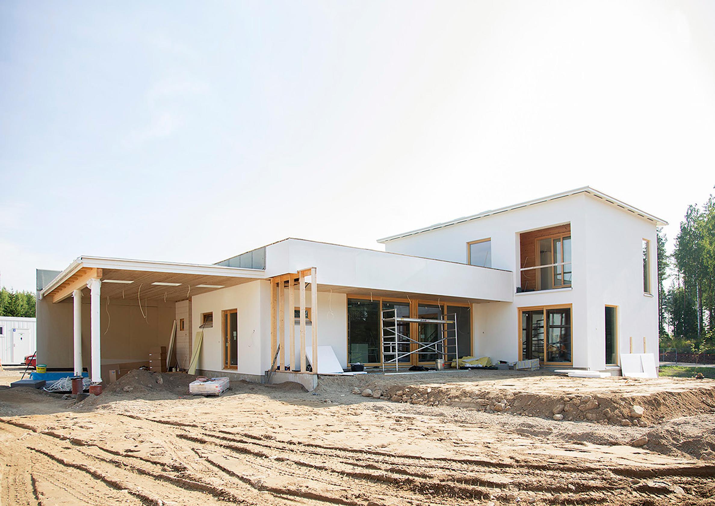 Lapsiperheen rapattu puutalo